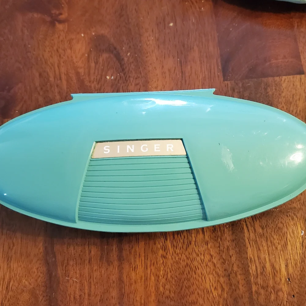 Singer button holer